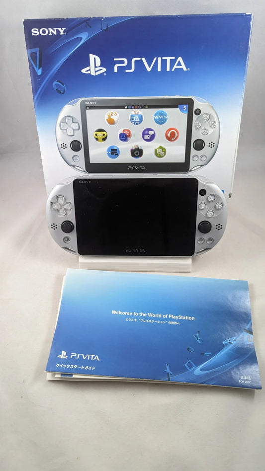 PS VITA Play Station Vita Plata Clara + CAJA - C/CAJA + CARGADOR + INSTRUC[COMPLETA]